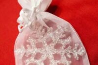 17 a sparkling snowlake ornament is a great solution for a winter or a NYE wedding favor