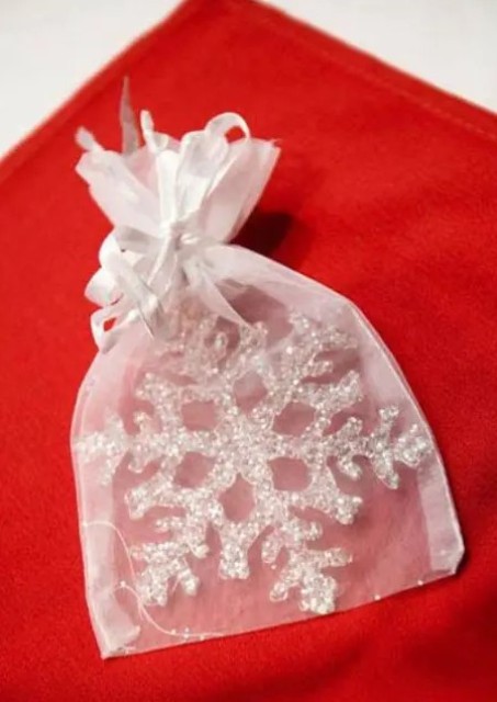 a sparkling snowlake ornament is a great solution for a winter or a NYE wedding favor