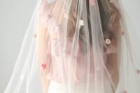 20 a clear veil with pink and white silk flowers is a beautiful accessory to add to a chic bridal look