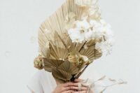 23 a modern glam wedding bouquet of gilded fronds, wihte orchids, lunaria and ribbon for a modern NYE bride
