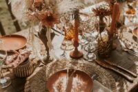 27 a beautiful Western fall wedding centerpiece of pretty rust-colored dried blooms, pampas grass and leaves is a lovely and rich-toned solution