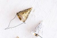 27 sparkling silver and gold cone hats are cute and fun as NYE wedding favors, they look great and are easy to make