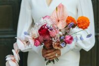 29 a stylish and catchy modern wedding bouquet of pink, red and blush blooms, orange and blue ones plus orchids is a cool idea for a modern bride