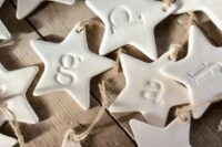 29 white clay star-shaped ornaments with monograms are amazing for Christmas and NYE weddings, make them yourself