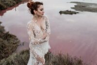 32 a celestial white sheer wedding dress with long sleeves and a train can be worn with some underwear or a bodysuit under