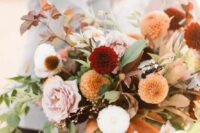 33 a beautiful fall wedding bouquet of white, pink, burgundy, orange blooms, greenery and dark foliage with much dimension is amazing
