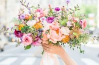 43 a colorful spring wedding bouquet with hot pink, blush, mustard and lilac blooms with blush ribbons