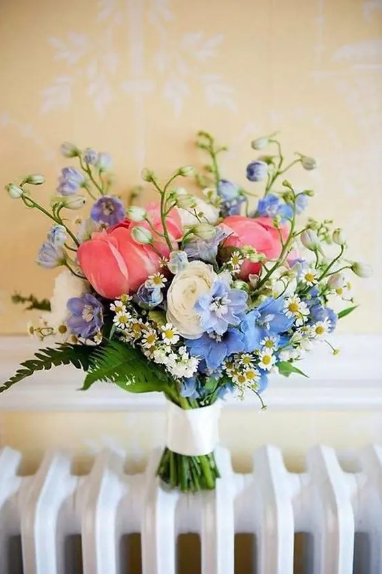 a dreamy wedding bouquet with pink and blue flowers, daisies, ferns is a chic and beautiful idea for spring