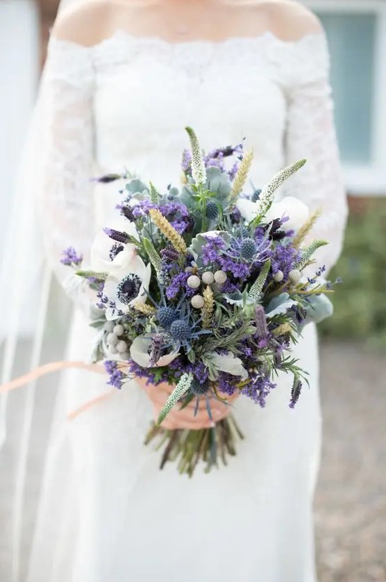 wheat, purple lavender, white anemones, blue thistles and various greenery for a colorful statement