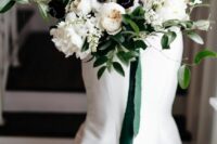 an adorable wedding bouquet with peony roses