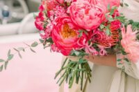 03 a beautiful pink wedding bouquet of peonies, pincushion peoteas and other flowers and greenery is bold and cool