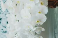 03 a cascading white orchid wedding bouquet is a refined and timeless idea for an exquisite bride