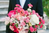05 a bold and elegant wedding bouquet with white, light and hot pink blooms, orange flowers and greenery is a fantastic idea to add color to the bridal look