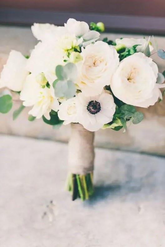 a white peony and anemone wedding bouquet with a twine wrap is a stylish idea with a touch of whimsy