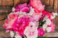 06 a bold pink wedding bouquet of light and hot pink blooms and greenery is a fantastic idea for a bold wedding