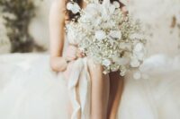a cute all-white wedding bouquet