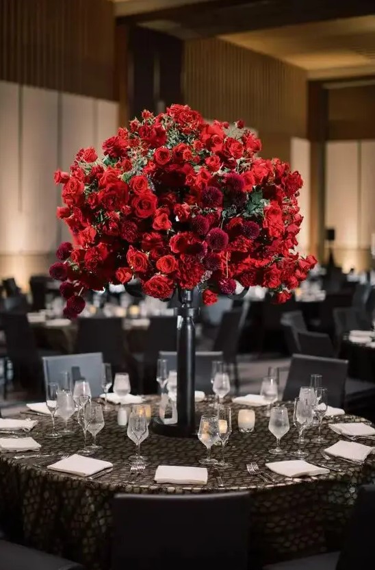 a lush and beautiful red rose wedding centerpiece with burgundy dahlias is a stunning idea for a Valentine's Day