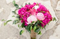 12 a bright wedding bouquet with bougainvillea, pink peonies and a pink rose is a cool bold idea for a wedding
