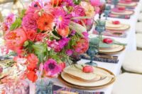 an awesome colorful wedding table setting