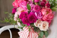 18 a bright wedding bouquet of pink, hot pink and fuchsia blooms, greenery and striped ribbons is a fantastic solution
