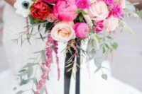 21 a bright wedding bouquet with neutral roses and anemones, pink roses and peonies, greenery and black ribbon