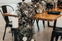 27 a jaw-dropping black and white wedding table runner of black and white blooms, fresh and dried ones, and black and white candles of various shapes