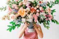 28 a jaw-dropping colorful floral wedding centerpiece of white, pink, yellow, blush and blue blooms and greenery is wow