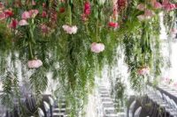 36 keep your reception clutter-free creating such lush greenery and pink bloom installations over the tables