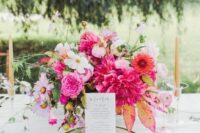 40 a bright wedding centerpiece of white, light and hot pink and orange blooms, bright foliage and greenery is a bold and cool idea