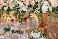 42 beautiful wedding table decor with neutral and blush florals incorporated with tall and usual wedding centerpieces create a blooming garden feel