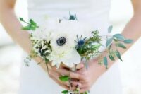 44 a delicate small wedding bouquet of white peonies, anemones, thistles, greenery and privet berries will be a nice solution for a spring or summer bride