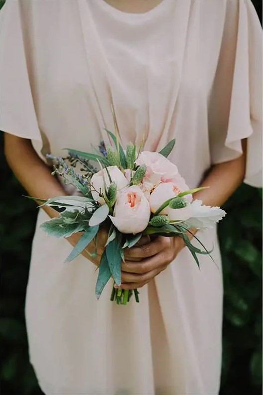 a small and cool wedding bouquet of blush peonies, lavender, bunny tails and greenery is a catchy idea for a spring or summer bride