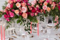 50 beautiful wedding table decor with light, peachy and hot pink blooms, pink candles and fuchsia blooms over the table