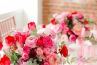 52 a lush wedding centerpiece with blush, light and hot pink blooms and greenery are amazing for a Valentine wedding