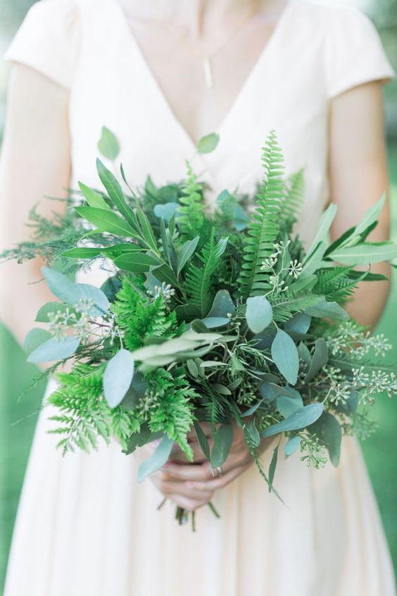 a textural greenery wedding bouquet wiht various types of foliage and leaves is amazing for spring or summer