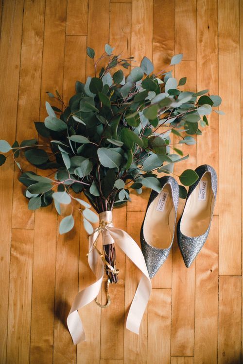 a eucalyptus wedding bouquet with neutral ribbons is a gorgeous idea for any casual and modern wedding