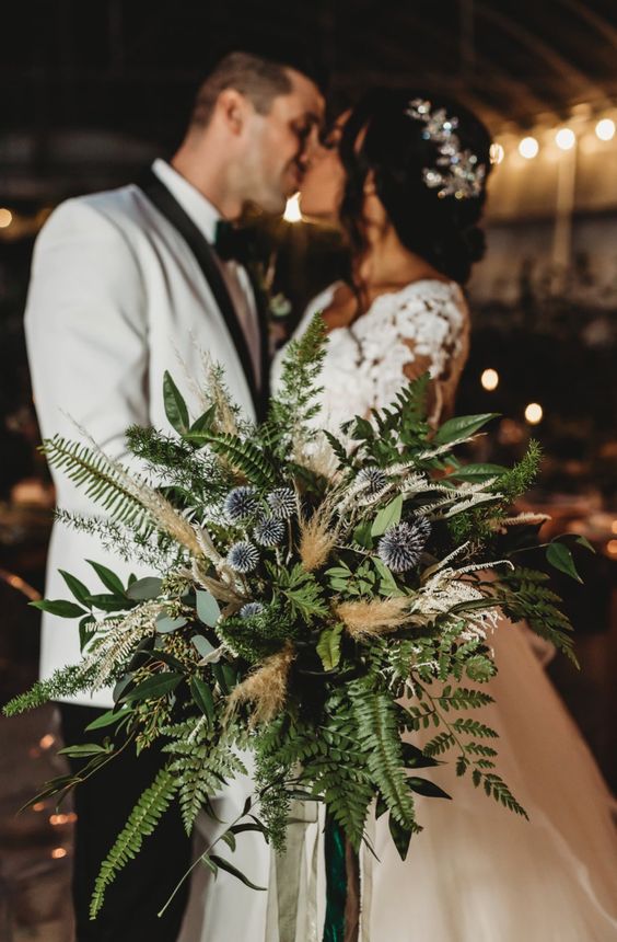 a greenery wedding bouquet with allium and pampas grass is a textural and lush idea for a wedding