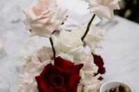 64 a whimsical blush and red rose wedding centerpiece is a lovely idea that will always catch an eye due to the shape and contrast