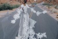 a fabulous sheer grey capelet with white lace is a fantastic statement for this simple bridal look