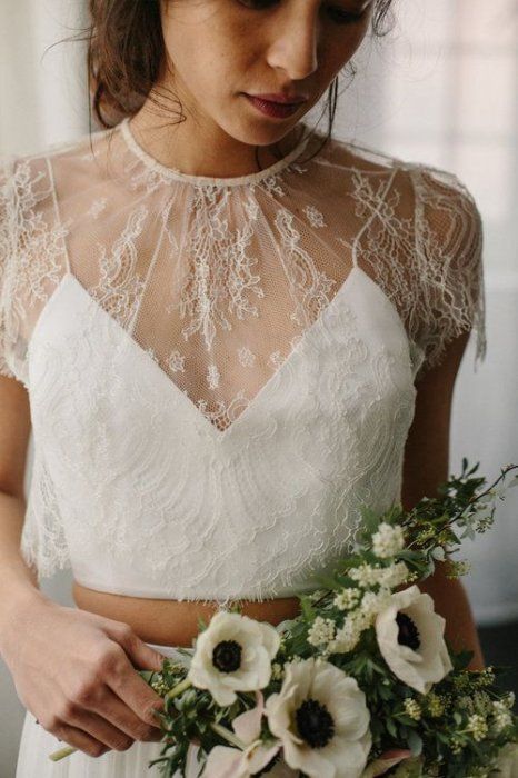 a plain crop top paired with a lace dress topper for a more refined and feminine feel in the bridal look