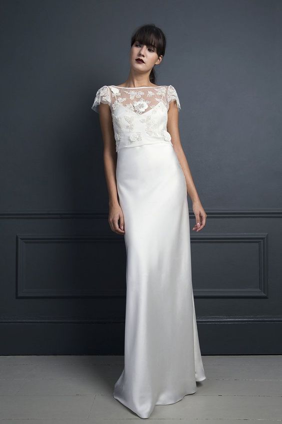 a silk slip wedding dress with a sheer and lace applique dress topper that adds texture and interest to the look