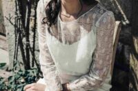 a simple modern wedding dress with a boho lace dress topper with long sleeves are a lovely combo for a modern boho bride