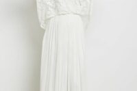 a strapless wedding dress with a pleated skirt and an oversized lace dress topper with short sleeves are a delicate and chic combo