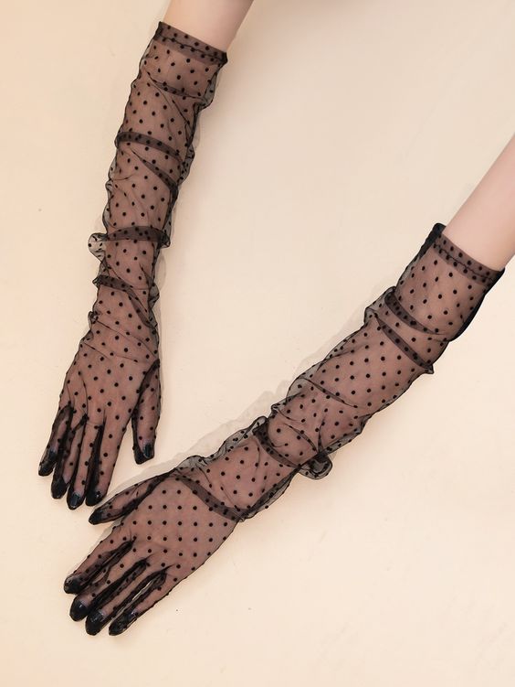 sheer black beaded long gloves will be a lovely idea for a Halloween or dark romance wedding