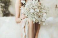 04 a beautiful baby’s breath and lunaria wedding bouquet for an airy feel and a unique look