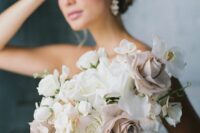 05 a beautiful modern wedding bouquet of mauve and white roses, white rochids is a lovely and chic idea for a modern wedding