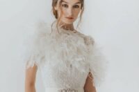 08 a feather bridal stole looks like part of the wedding dress, it’s a chic way to incorporate feathers into your bridal look
