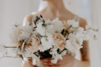 13 a lovely modern wedding bouquet with peachy, blush and white blooms is a lovely idea for a spring or summer wedding