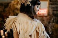 22 a small yet bold feather wedding cover up will become part of your wedding dress and will make your look fairy-tale inspired