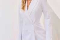 24 a white blazer mini dress with a feathered hem, a double row of buttons can be worn as just a blazer, too